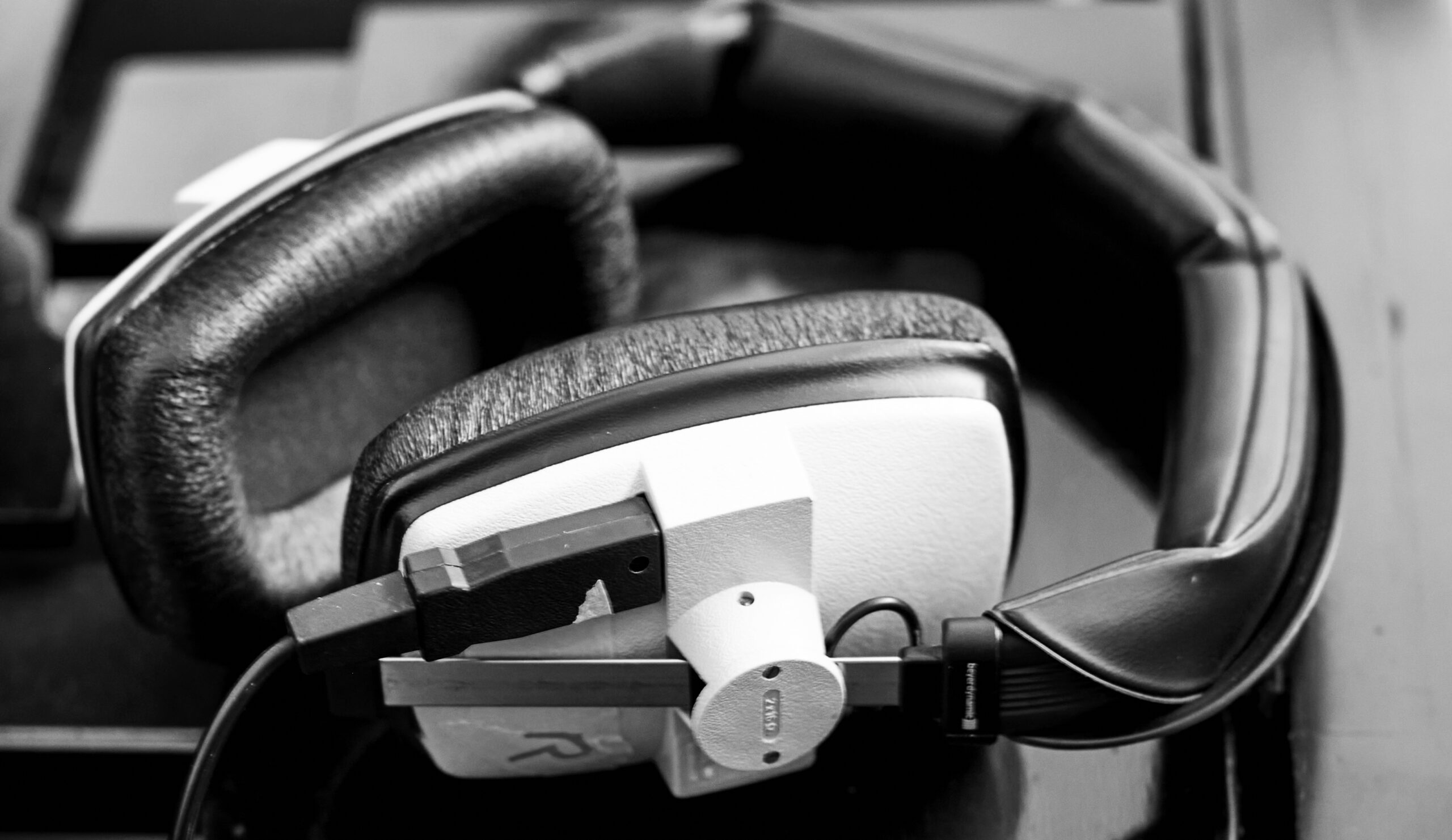 headphones on piano during recording session