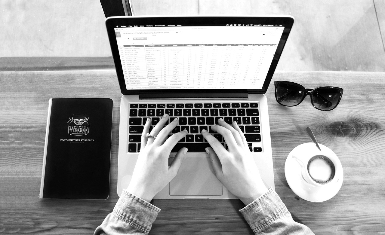 laptop showing music supervisor working on budget