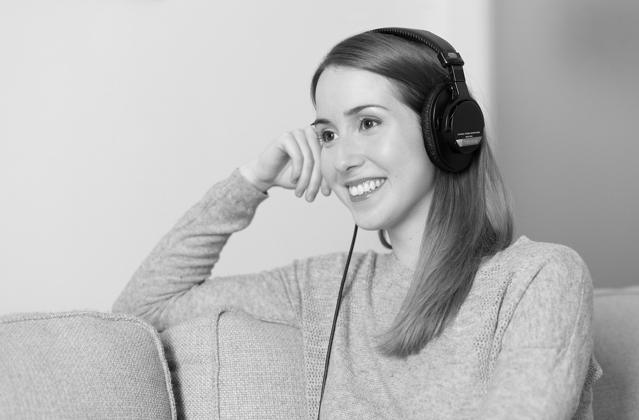 music supervisor listening to different pieces of bespoke music